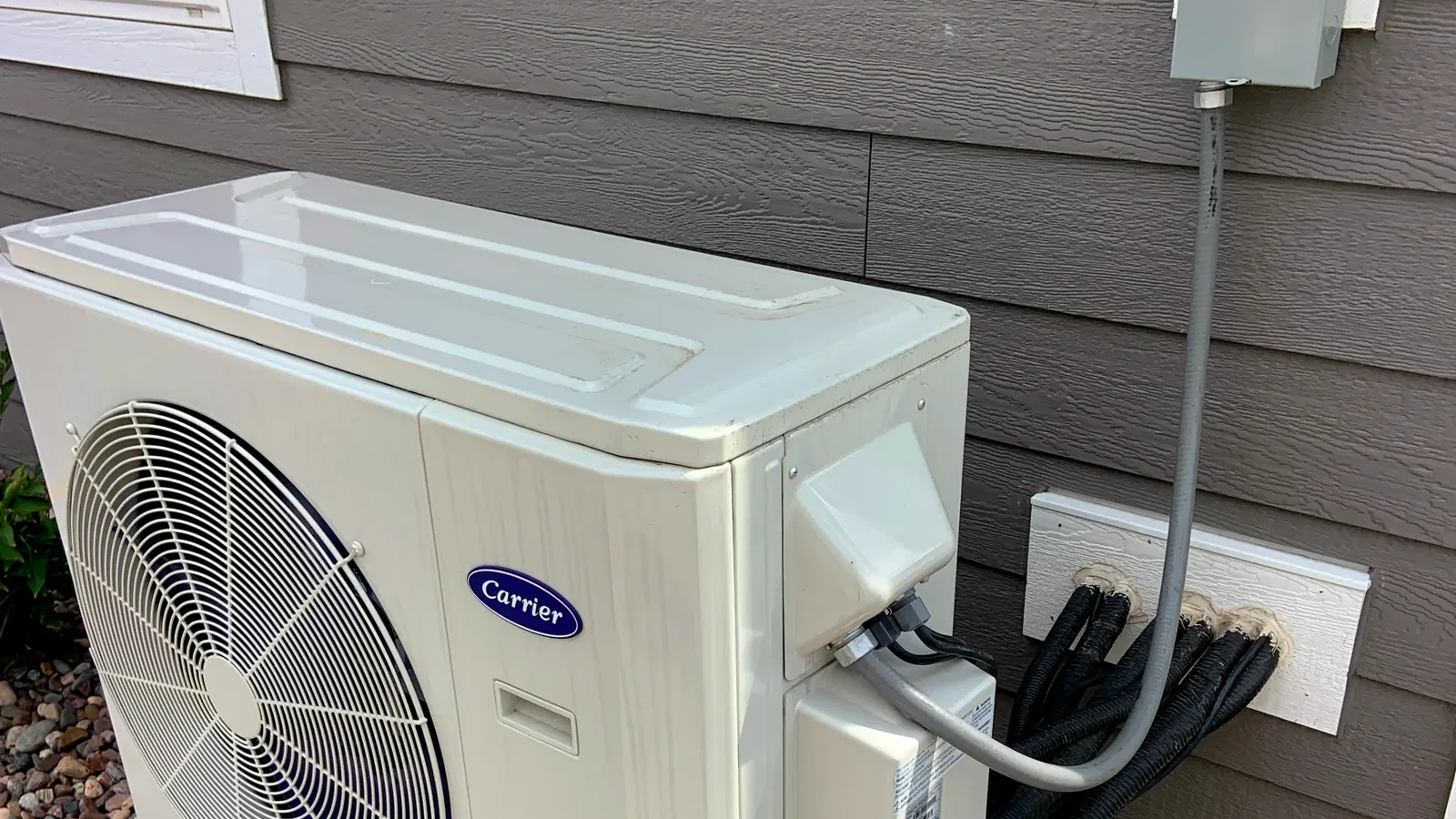 Residential HVAC outdoor unit on a concrete pad