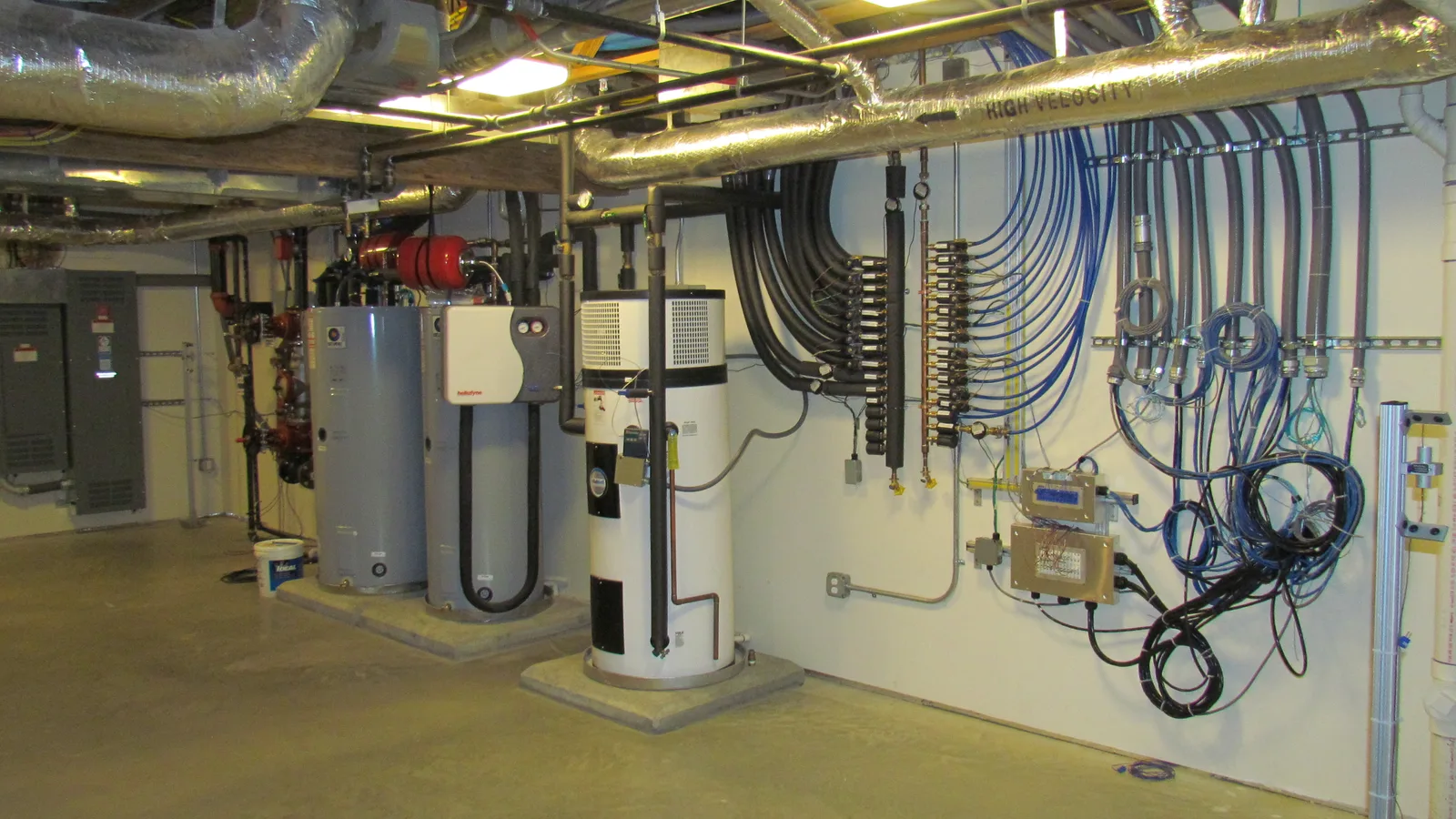 Heat pump water heater in a home utility room